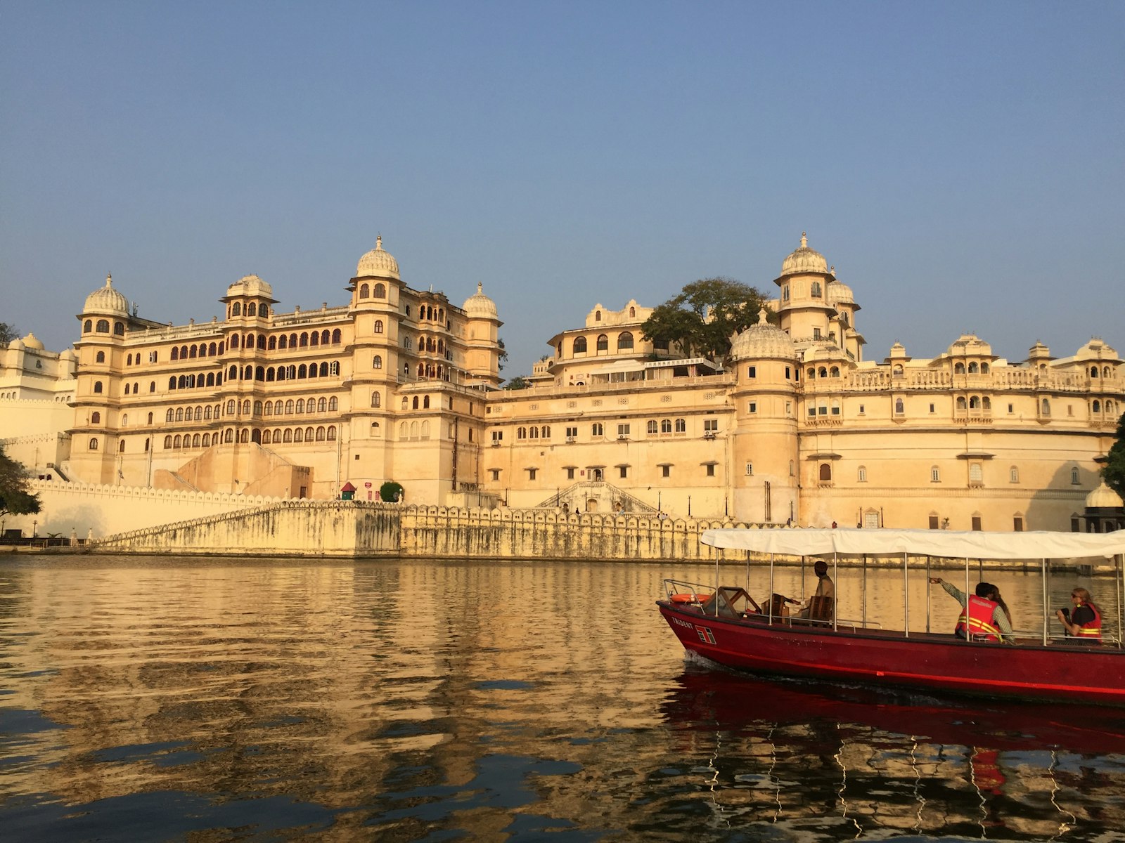 Udaipur City Palace overlooking Lake Pichola at golden hour
